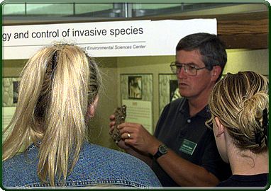 Fishery Biologist Mike Dewey gives a  tour of the Center for students (photo)