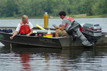 Students collecting water samples on the Upper Mississippi River